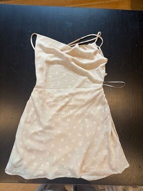 Princess Polly Cream Daisy Mini Slip Dress with cross straps in the back